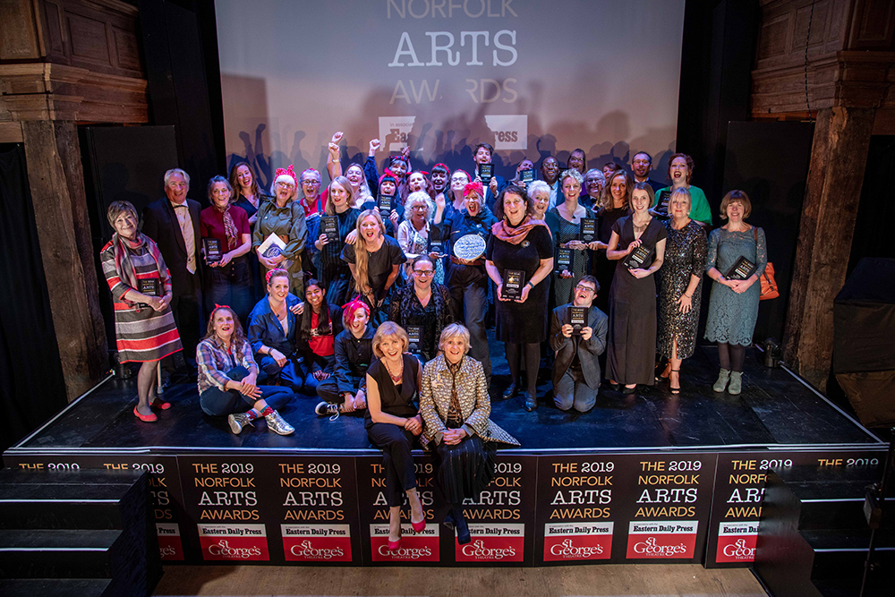 The 2019 Norfolk Arts Awards at St George's Theatre, Great Yarmouth. All the winners together with host Christine Webber and Helen McDermott(front). Photo credit ©Simon Finlay Photography.